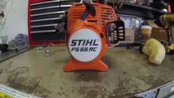 Stihl FS55 RC clutch drum, clutch, and flywheel removal.