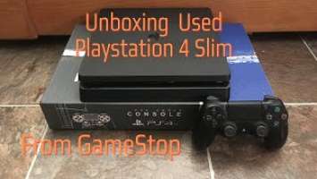 Unboxing a used PS4 slim from GameStop.